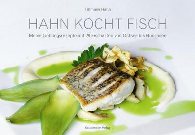 Hahn kocht Fisch